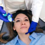 Woman receiving dermal filler treatment