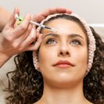 Woman receiving dermal fillers at Yes Aesthetics KC